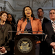 San Francisco Board of Supervisors President and now former interim Mayor London Breed (center) speaks at a news conference at City Hall in San Francisco on Dec. 12, 2017. (Jeff Chiu/AP Images)
